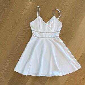 Altar'd State white Spaghetti Strap Dress with cutout detail.